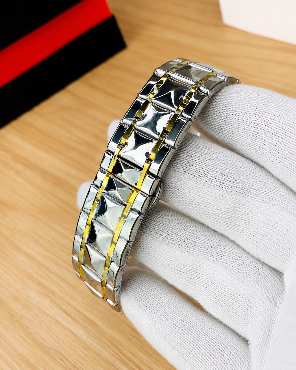 Royal Crest black and gold luxury watch for men with two-tone metal strap.